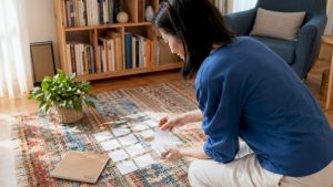 Adult woman studying Chinese vocabulary with flashcards