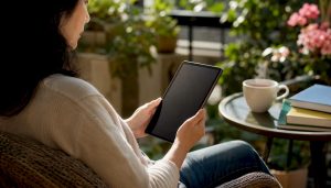 Adult reading Mandarin on tablet at desk