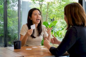 Adult learner speaking Mandarin in class
