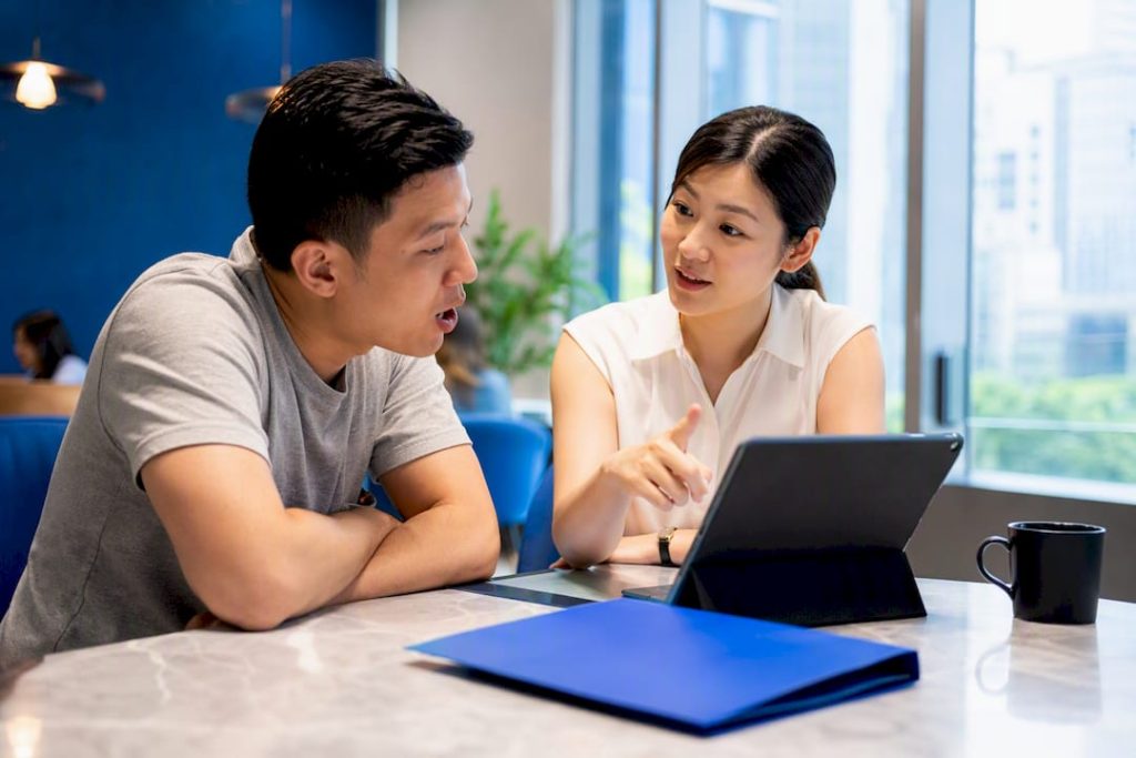 Adult learner practising Mandarin with tutor