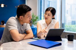 Adult learner practising Mandarin with tutor