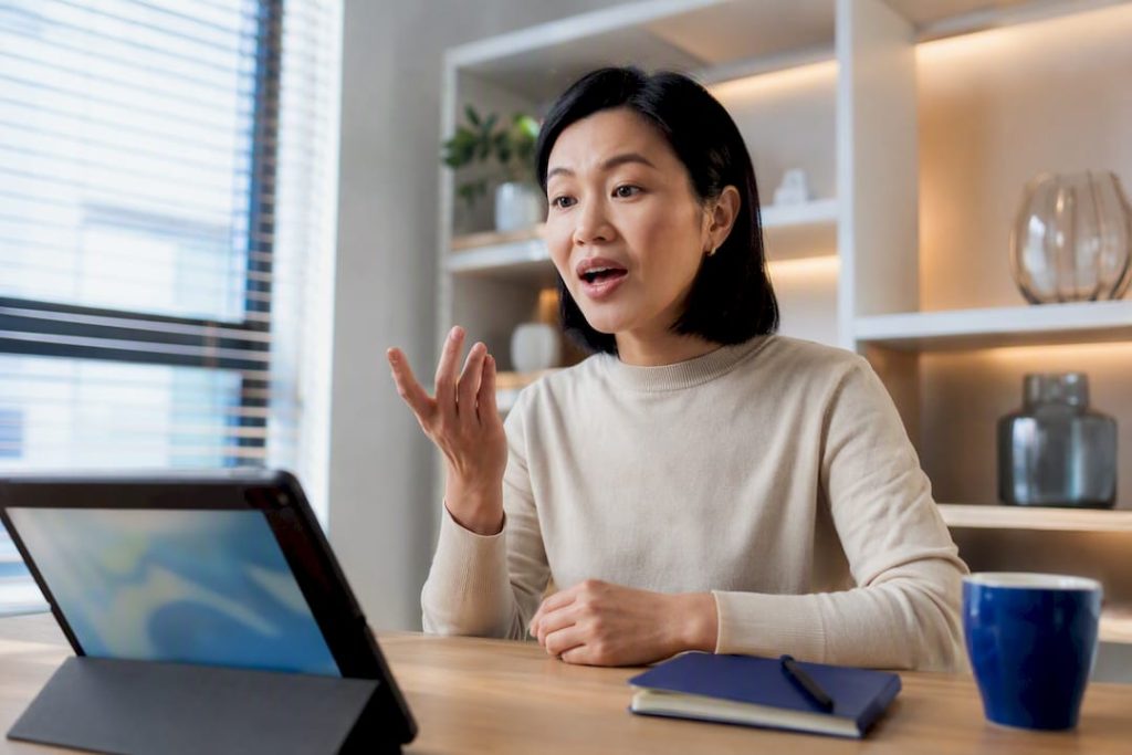 Adult practising Mandarin in online lesson