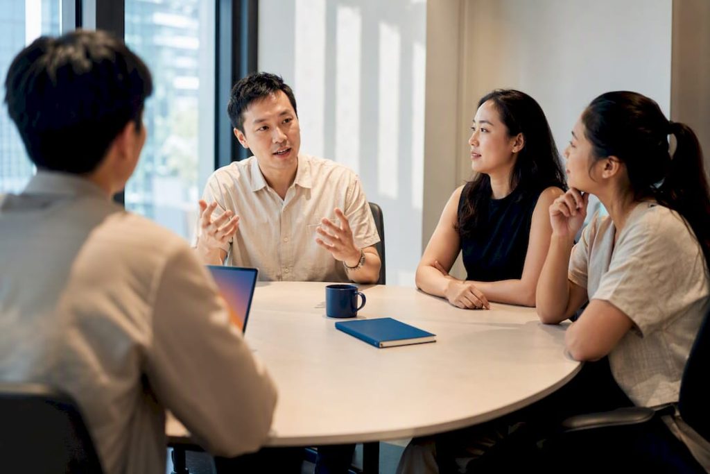 Adult learners practising Mandarin in small group