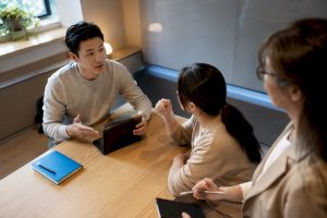 Adult learners practicing workplace Mandarin role-play