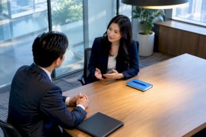 Lawyer speaking with Mandarin-speaking client