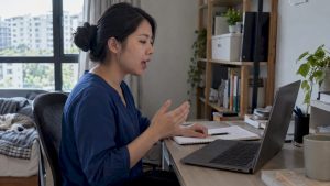 Adult learner practicing Mandarin online at home