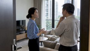 Agent and buyer discuss a property price