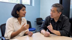 Adult learner practising Mandarin with a teacher